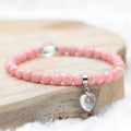 Bracelet "Compassion" en Rhodochrosite (Coeur en Quartz)