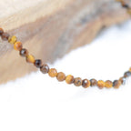 Bracelet "Confiance" en Oeil-de-Tigre à facettes - lespierresdubienetre