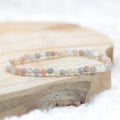 Bracelet "Féminité" en Pierre de Lune multicolore à facettes