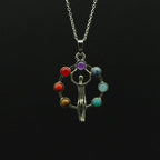 Pendentif "Vitruve" des 7 chakras - lespierresdubienetre